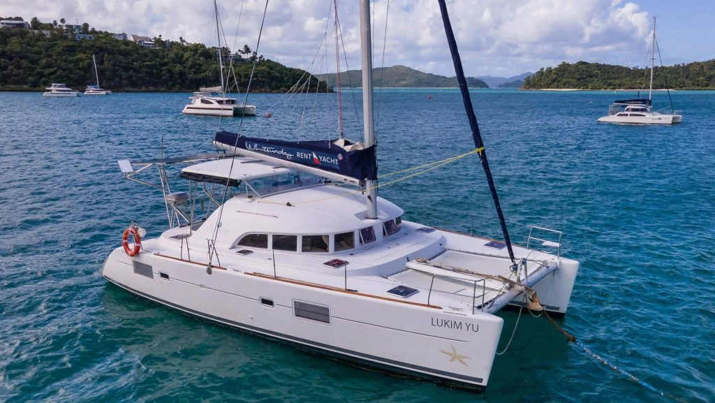 Lukim Yu, a catamaran chartered by Rent a Yacht